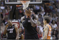 Miami's LeBron James reacts after charged with a foul.