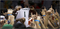 Miami's Durand Scott celebrates with fans.