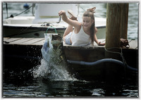Feeding the six foot long tarpons at Robbies Cafe in the Florida Keys.