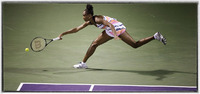 Venus Williams returns a ball