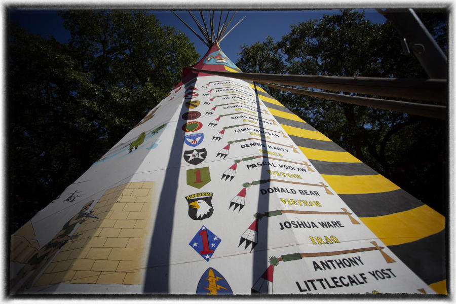 A list of the war dead is seen on the side of a tipi during the Veterans' Day ceremony.  : The First Americans : Oklahoma City Editorial and Documentary Photographer 