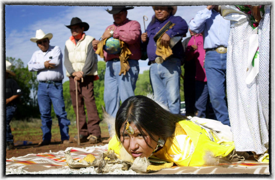 The girl is massaged into womanhood by her sponsor to "mold her" into Changing woman or White Painted Woman. : The First Americans : Oklahoma City Editorial and Documentary Photographer 
